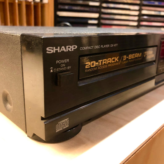 Vintage Sharp DX-677 Single Disc 3-beam 20 Track CD Player.