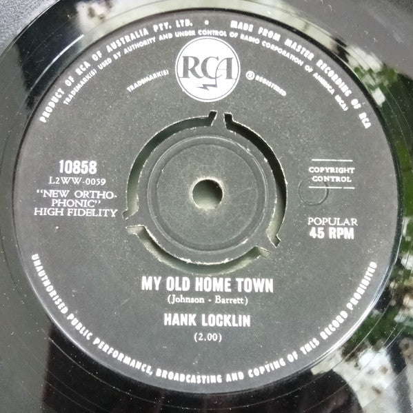 Hank Locklin - Please Help Me, I'm Falling (7", Single, 45 RPM) (Good Plus (G+))