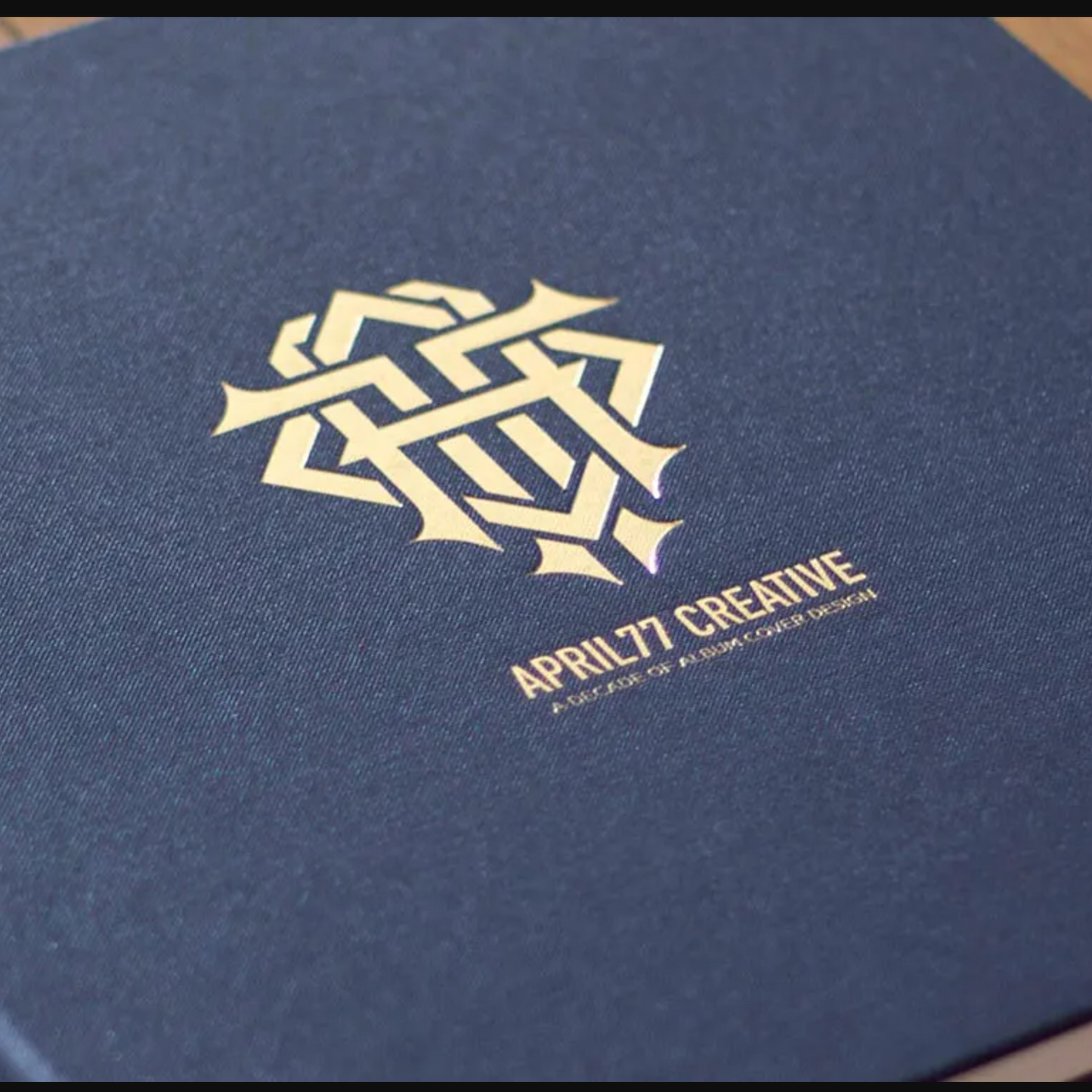 April 77: A Decade Of Cover Designs (Hardcover)